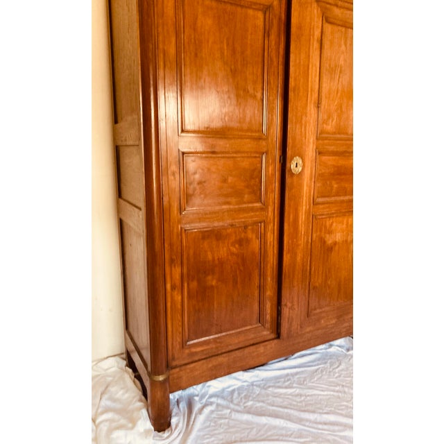Antique French Empire Armoire Walnut, Columns to Either Side Front With Bronze Gilt Mounts Also Gilt Bronze Key Hole For Sale - Image 10 of 12