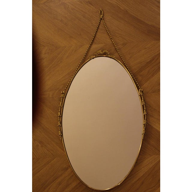Oval Brass Wall Mirror with Neoclassical Decoration and Brass Chain, 1950s For Sale - Image 10 of 17