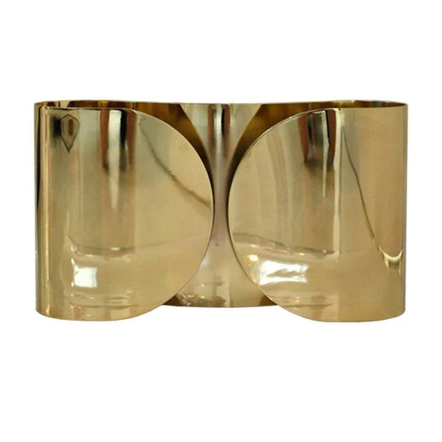 Pair of sconces model ''Foglio'' designed by Tobia Scarpa for Flos. Structure made of brass and composed of two bulbs each...