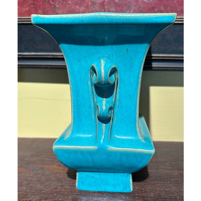 Here we have a super hand made Galloway of Philadelphia architectural vase with a wonderful blue green vase with the edges...