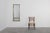 This large French Neo‑Classical mirror from the 20th century combines architectural elegance with a warm, sculptural...