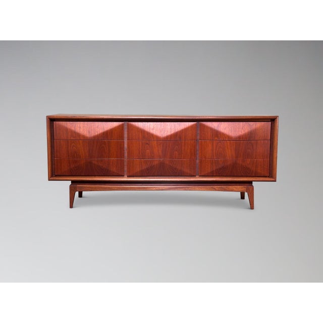 Fully restored nine-drawer walnut lowboy dresser attributed to Vladimir Kagan for United Furniture c. 1970. This expertly...