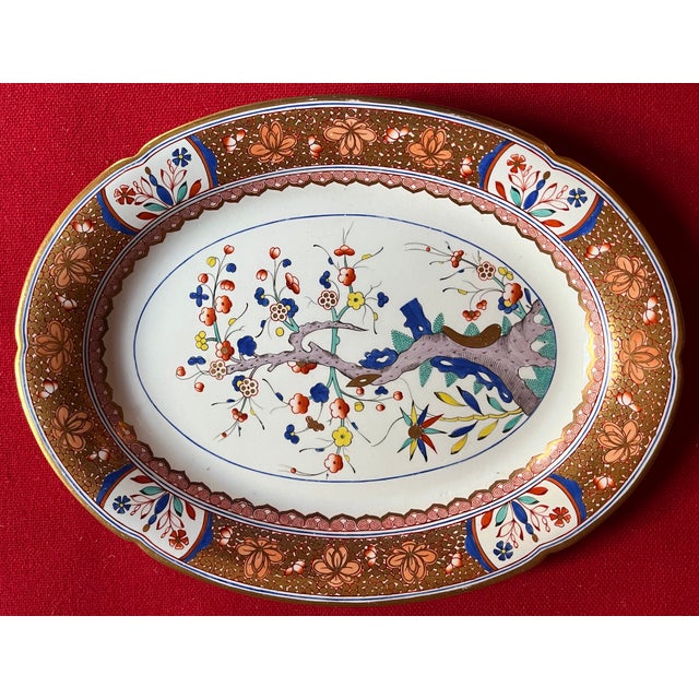Pair antique early 19th century English George III Spode porcelain oval serving platters. Decorated with a colorful...
