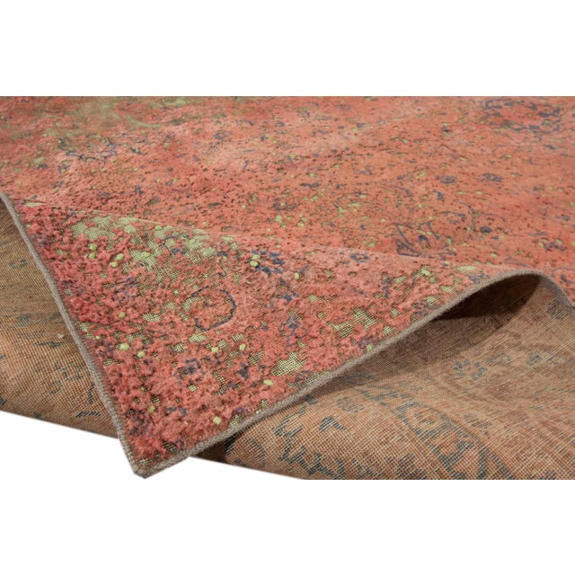 Beautiful vintage Overdyed hand-knotted wool rug with a rust field. This piece has green and dark gray accents in an all-...