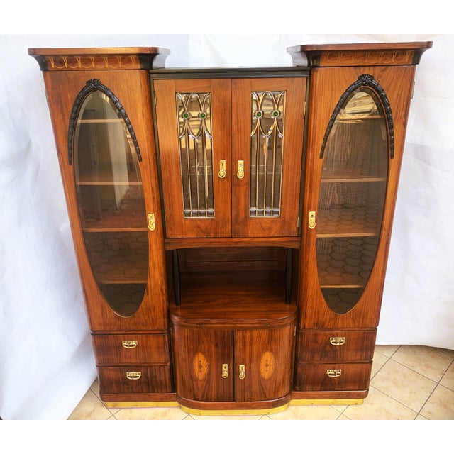 Here are some details about this furniture: 1. **Style and era**: Art Nouveau, as indicated by the shapes, decorations and...