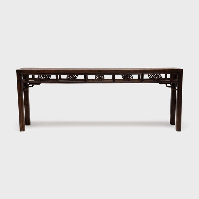 This large Chinese console table dates to the mid-19th century and was once used in the main hall of a traditional home as...