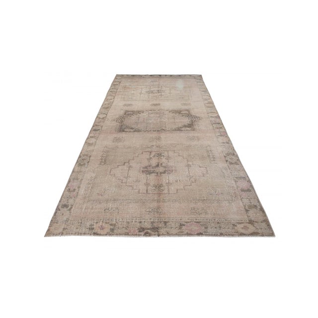 Vintage handknotted decorative wool rug from Kars region of Turkey. Approximately 50-60 years old. In very good condition.