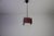This acrylic glass pendant lamp was produced in germany in the 1970s and reflects the bold, geometric design language of...