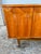 A striking French Mid-Century Modern sideboard crafted in rich mahogany, dating to the 1950s. Featuring beautifully...