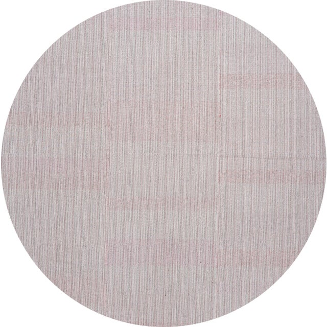 A beautiful mid-20th century flat-weave rug with an all-over gray motif. This piece has fine details, great colors, and a...