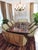 This handcrafted English Art Deco styled 9-piece dining set is made from hardwood and finished in a flame veneer. The set...