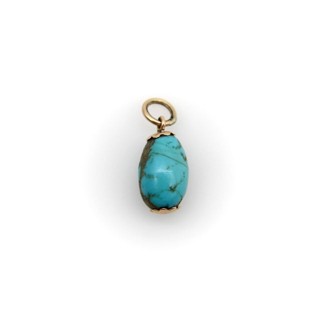 This is a very old turquoise bead with an amazing, saturated rich color. Circa the Victorian era, the turquoise, a porous...