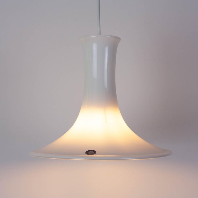 A refined example of Danish modernist lighting, this Mandarin pendant lamp was designed by Michael Bang in 1983 and...