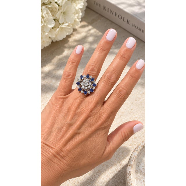 A dazzling expression of mid-century glamour, this bold cocktail ring is crafted in 18K white gold and designed in a...