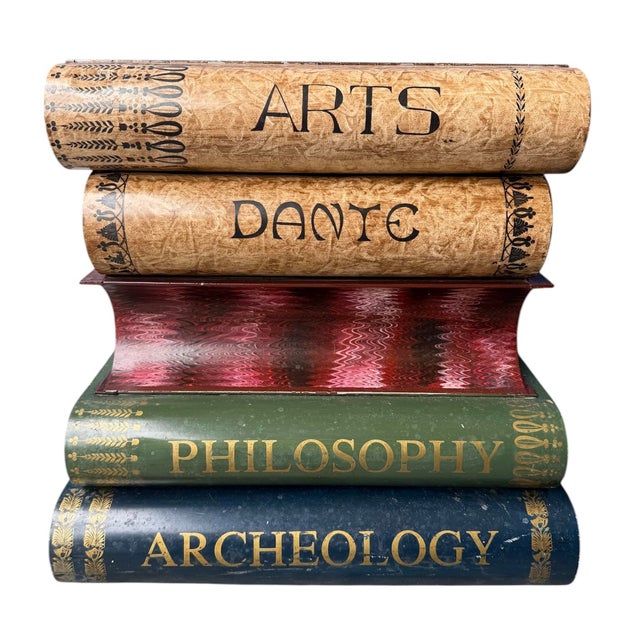 vintage Italian tole metal stacked book end table featuring a trompe l'oeil design. Nice to use as an end table with storage.