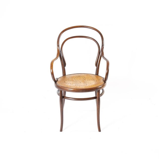 The Thonet Armchair No. 14 is a classic of Viennese furniture design, created by Michael Thonet in 1860. This particular...