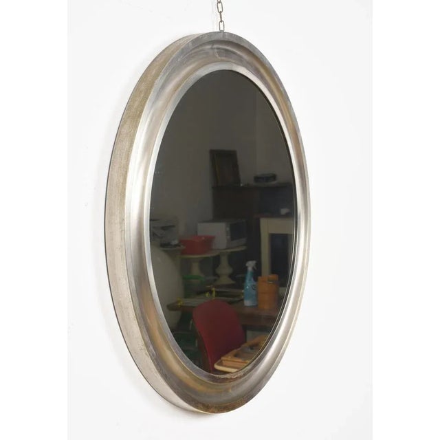 Sergio Mazza Mid-Century wall mirror in aluminum and metal for Artemide, produced in Italy during 1960s. This astonishing...