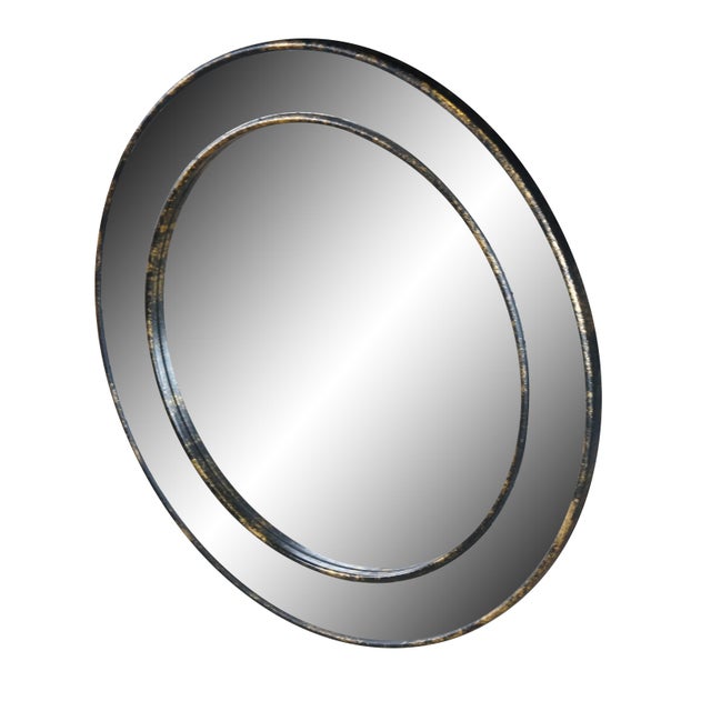 Solid wood frame with Antiqued Bronze finish. Hand-inlaid mirrored glass tiles in a Bronzed Foxed-finish. Dimensions: 30"