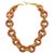 This is a Kenneth Jay Lane vintage coral and gold chunky link necklace. Twelve coral color resin donuts link with double...