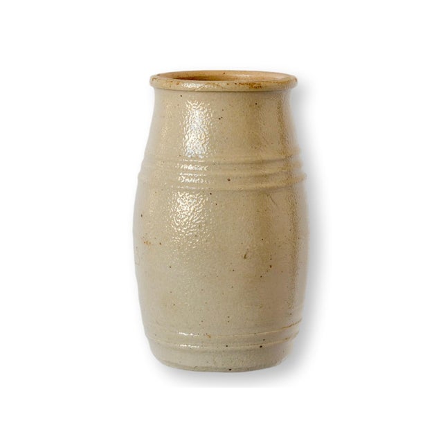 Antique French stoneware mustard pot produced by L. Lepoutre & Fils of Wervicq, featuring a warm, neutral cream glaze with...