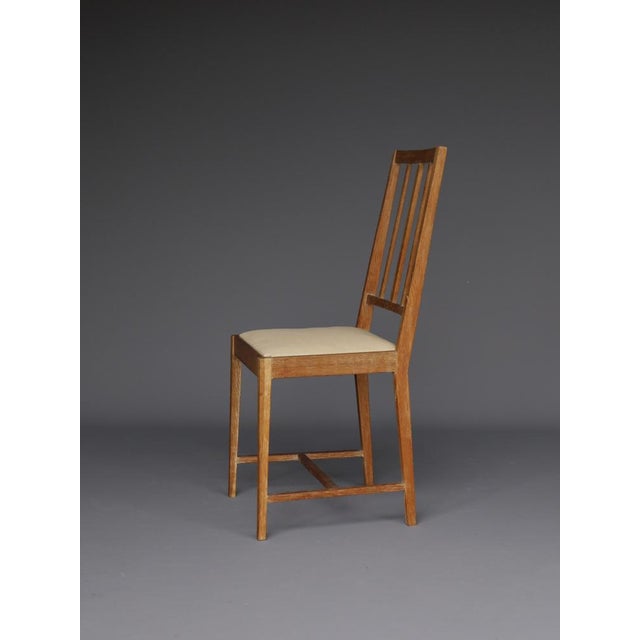 A very elegant oak side chair. It has similarities to the furniture retailed by Heals of London in the 1930s. Its...