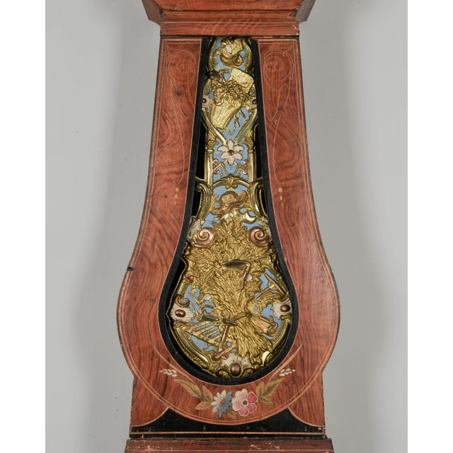 A 19th century Country French comtoise, or grandfather clock, with polychrome painted pine case and embossed brass...
