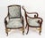 This is a fantastic and highly decorative antique pair of French ormolu mounted mahogany Empire fauteuil armchairs, circa...