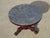 A magnificent small round table from the early 19th century, combining solid mahogany and a beautiful marble top decorated...