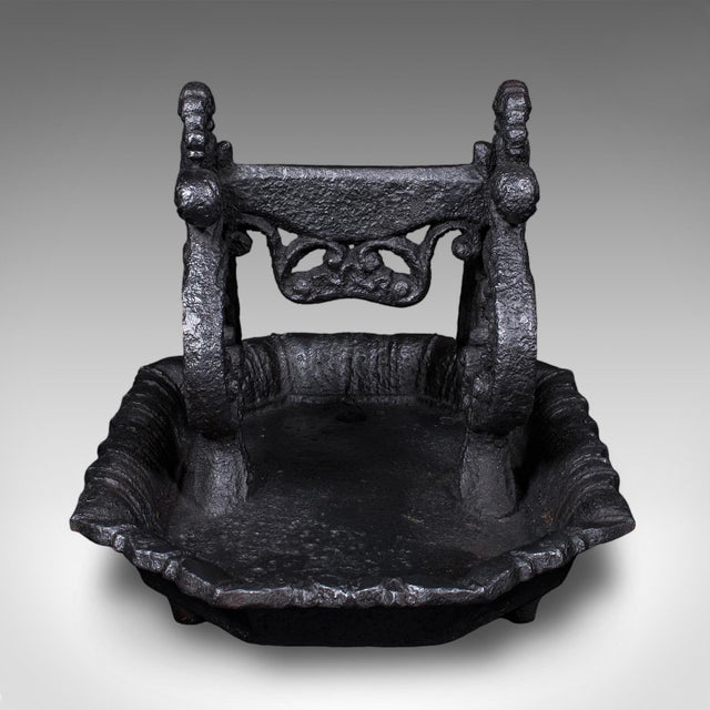 This is an antique townhouse boot scraper. An English, cast iron shoe pull, dating to the Georgian period, circa 1800. A...