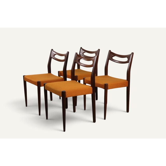 A beautiful set of four vintage chairs from the 1960s, featuring a design characteristic of Scandinavian furniture. The...