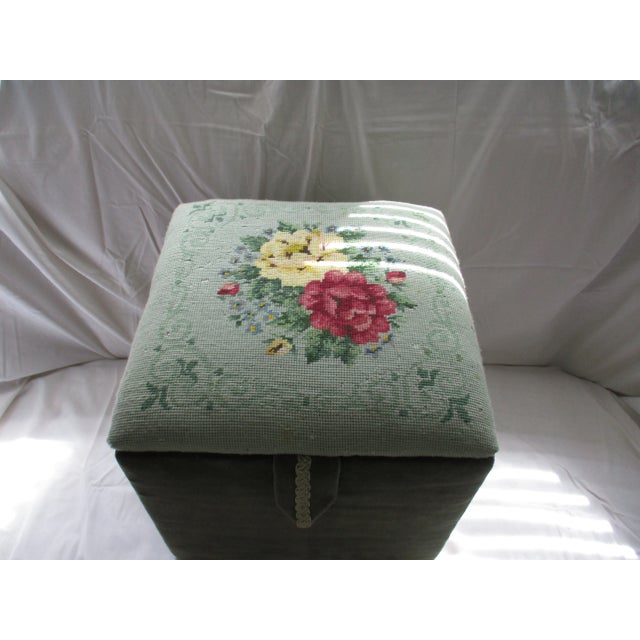 This is a Gorgeous Vintage Green Needlepoint Storage Footstool with a Green Velvet Bottom. the Piece has a Rose Design...