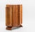 Fine Art Deco Amboyna Burr Table Cabinet. Circa 1930s. Of exceptional quality and notably rare, the cabinet has shaped...