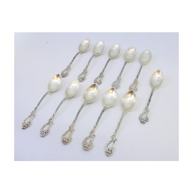 Silver Teaspoons with Reliefs and Shell Handles, Set of 11, in Good conditions.