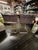 Pair of 1970's Knoll Spoleto Dining Chair with original brown leather. Unmarked. Some laces were replaced with leather...