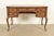 An exceptional French Provincial Louis XV style bureau plat writing desk By Sligh Furniture USA, Circa 1960s Carved...