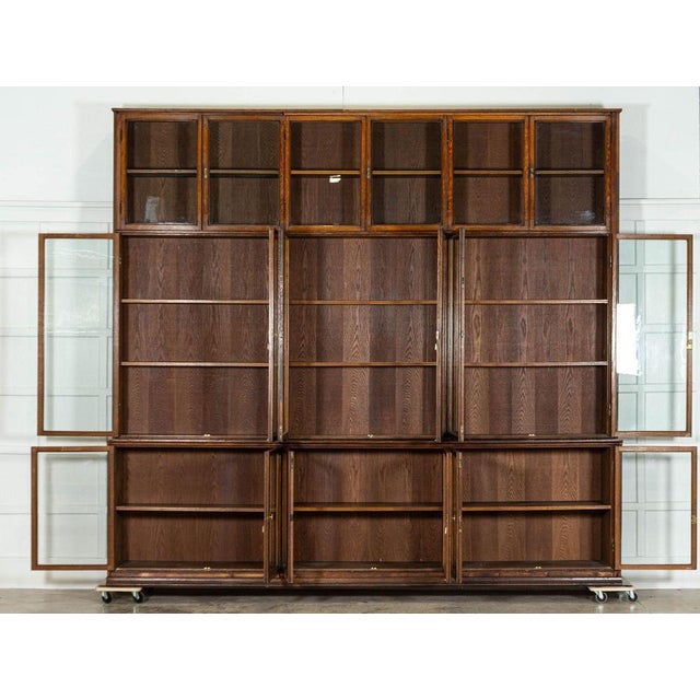 Circa 1890 monumental oak glazed haberdashery bookcase cabinet provenance: st james's, london. An exceptional example base...
