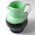 A beautiful Art Deco glass vase. The layered glass has a satin finish. The handle has a slightly opalescent finish. The...