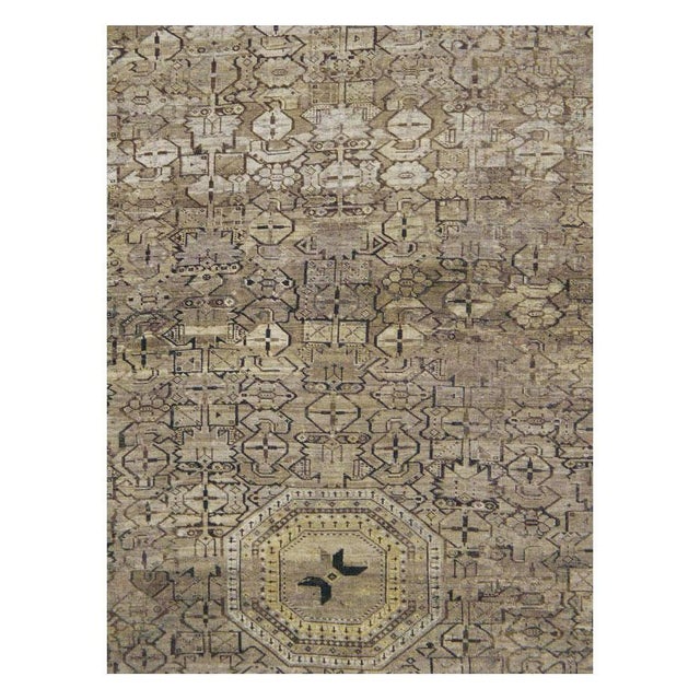 An antique Central Asian Beshir large room size tribal rug handmade during the early 20th century in neutral earth tones...
