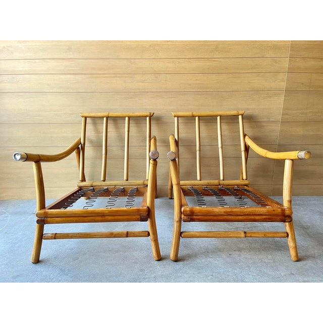 Pair of fully refinished 1950s John Wisner style lounge chairs with metal detail ready for your upholstery