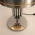 An iconic table lamp in true Space Age style, produced in the 1970s. This piece stands out for the strong geometric and...