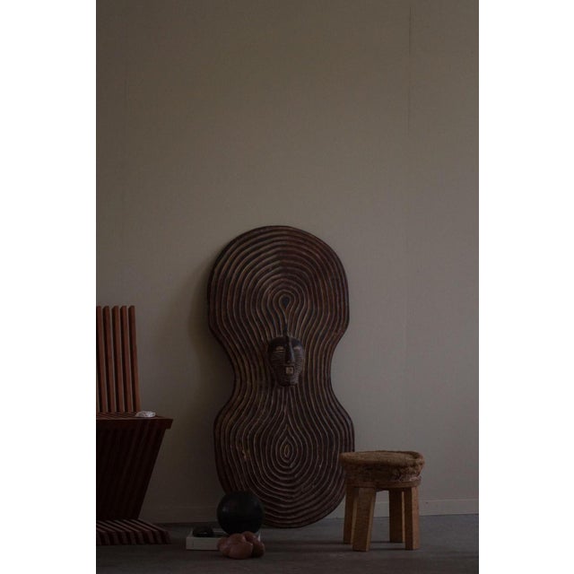 The Songye Shield is a striking example of African tribal art from the Congo, dating back to the mid-20th century. This...