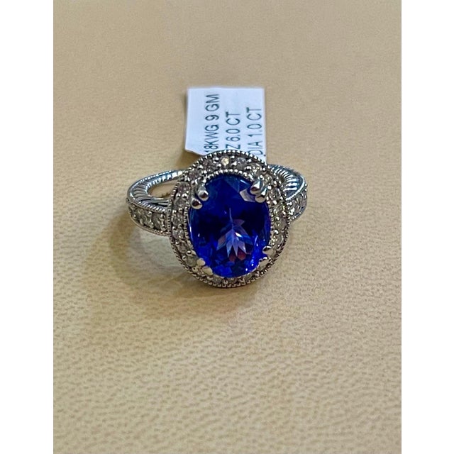 6 Carat Oval Tanzanite and 1 Carat Diamond Ring 14 Karat White Gold, Estate For Sale - Image 9 of 18