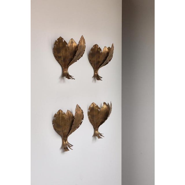 An exceptional and rare set of four sculptural wall sconces model 5395 by celebrated Danish lighting designer Holm...