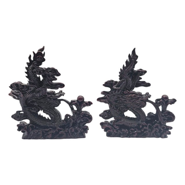 Pair of Vintage Chinese Red Resin Dragon Statues With Wood Look Finish and Feng Shui Motif For Sale