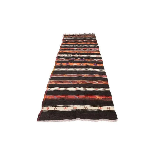 Vintage handwoven decorative kilim rug from Afyon region of Turkey. Approximately 50-60 years old. In very good condition.