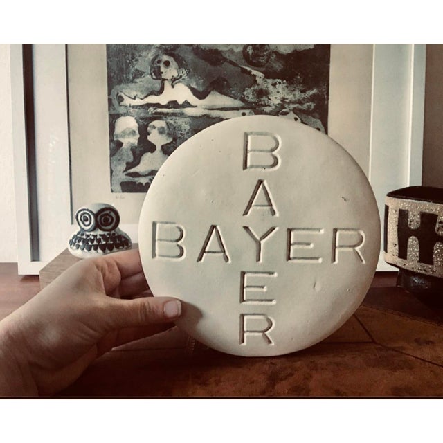 This giant Bayer aspirin is guaranteed to get rid of any aches or pains. Once used as an advertising display. 7” in...