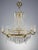 Elevate your interior with this stunning 1930s-40s French chandelier, meticulously crafted from high-quality brass and...