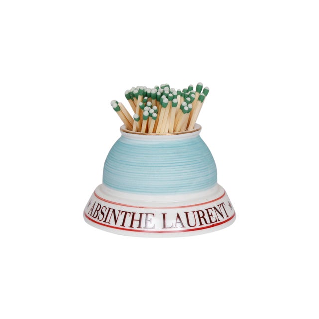 A pair of Parisian café ceramic match strikers and holders advertising Absinthe Laurent. Reads Absinthe Laurent, Maison...