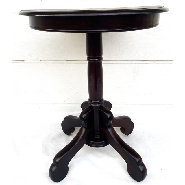 Round Ash Wood Coffee Table, 1920s The table is in good to very good condition. The tabletop has been refinished, stained,...
