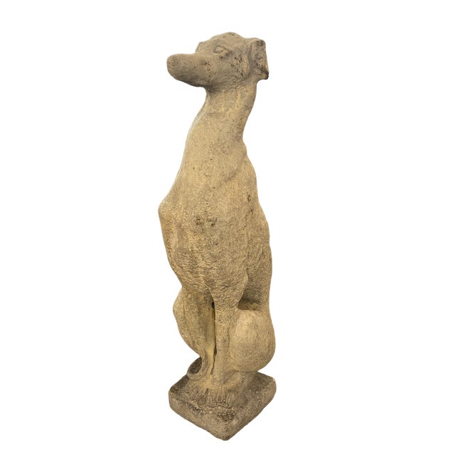 Greyhound of Italian origin made of stone. The carving work results in an elegant and stylized silhouette, characteristic...